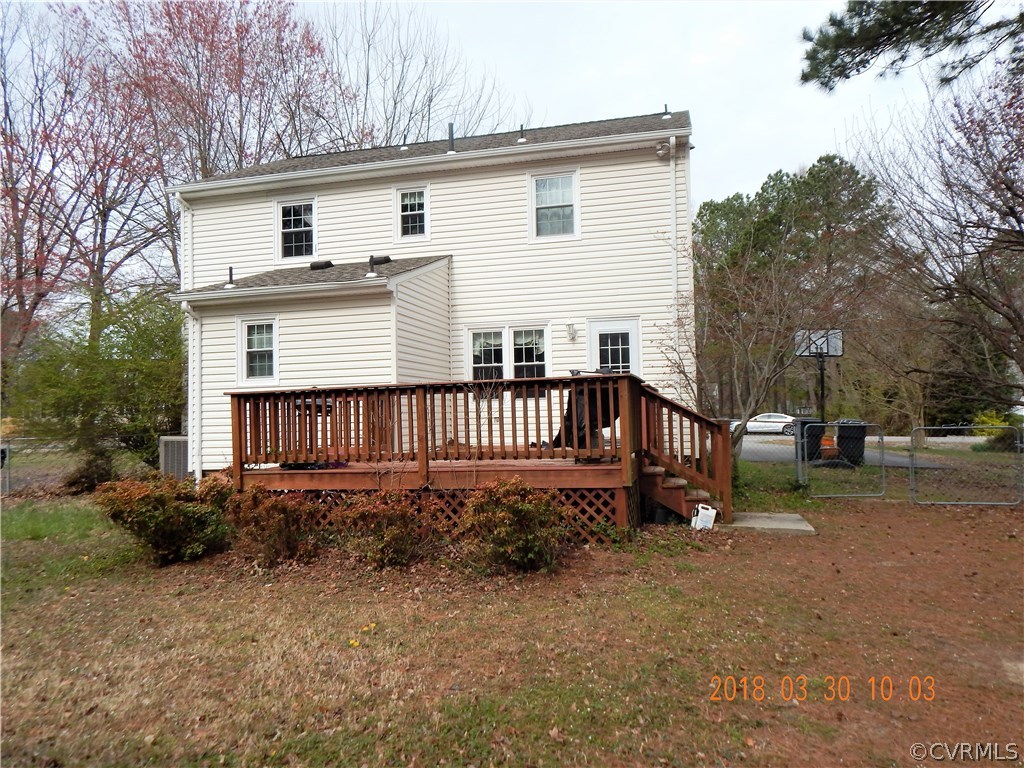 1427 Austin Road Chester, VA 23836 - Photo 3 of 5 a view of a house with a yard