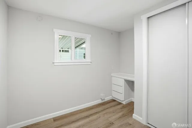 a view of an empty walk in closet