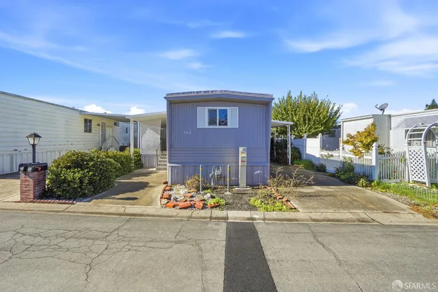 a view of a house with a patio