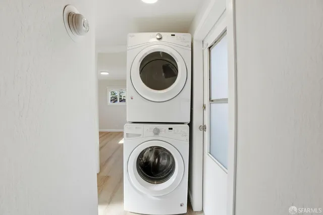 a view of a swimming pool with lounge chairs