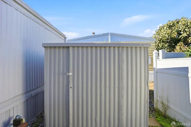 a sign broad on the side of the road