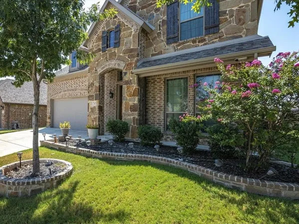 a front view of a house with swimming pool