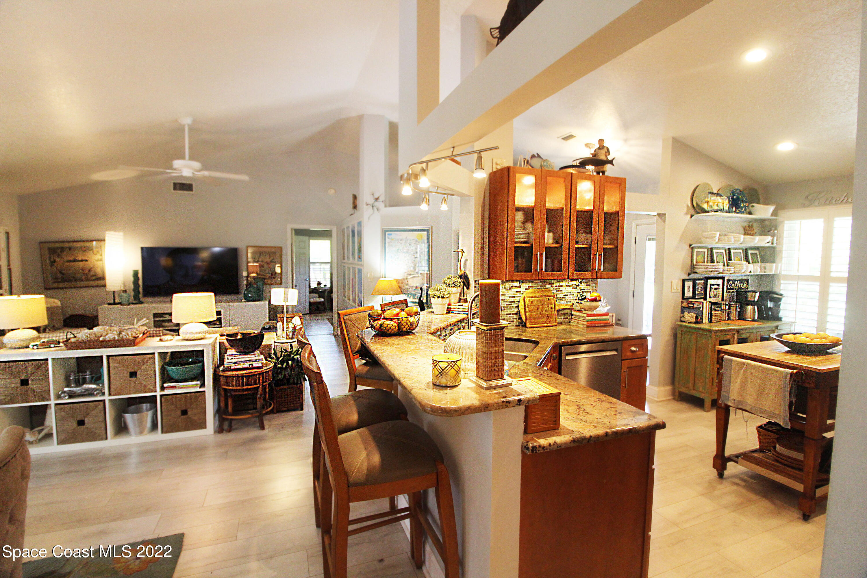2397 Chase Hammock Road Merritt Island, FL 32953 - Photo 15 of 35 a view of a dining room with furniture