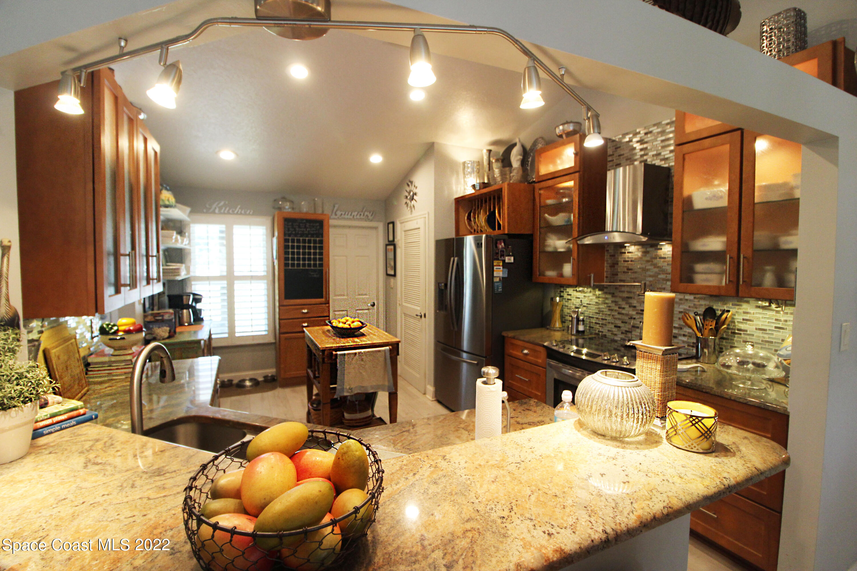 2397 Chase Hammock Road Merritt Island, FL 32953 - Photo 16 of 35 a room with lots of table and chairs