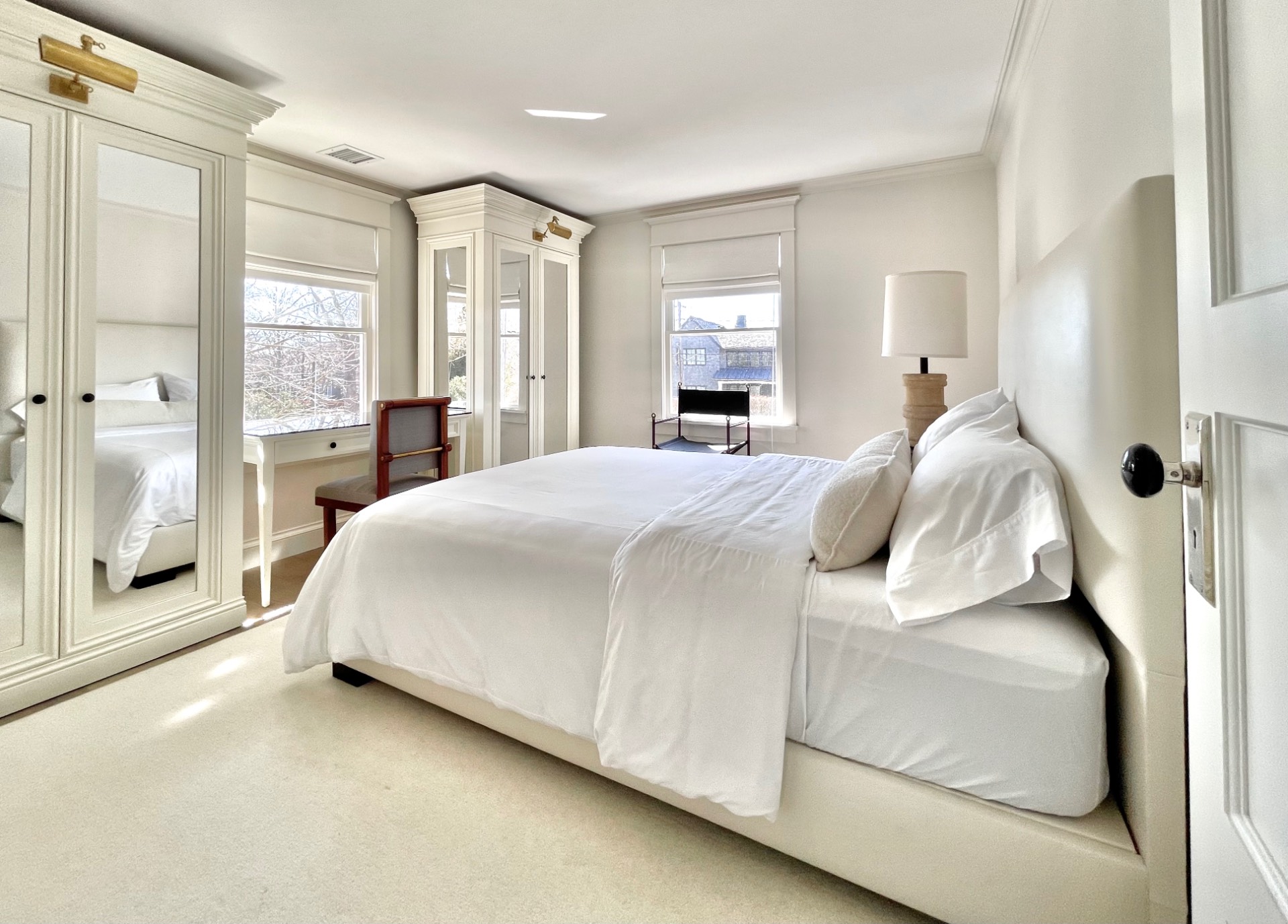 67 Norris Lane Bridgehampton, NY 11937 - Photo 20 of 32 a large white bed in a white room