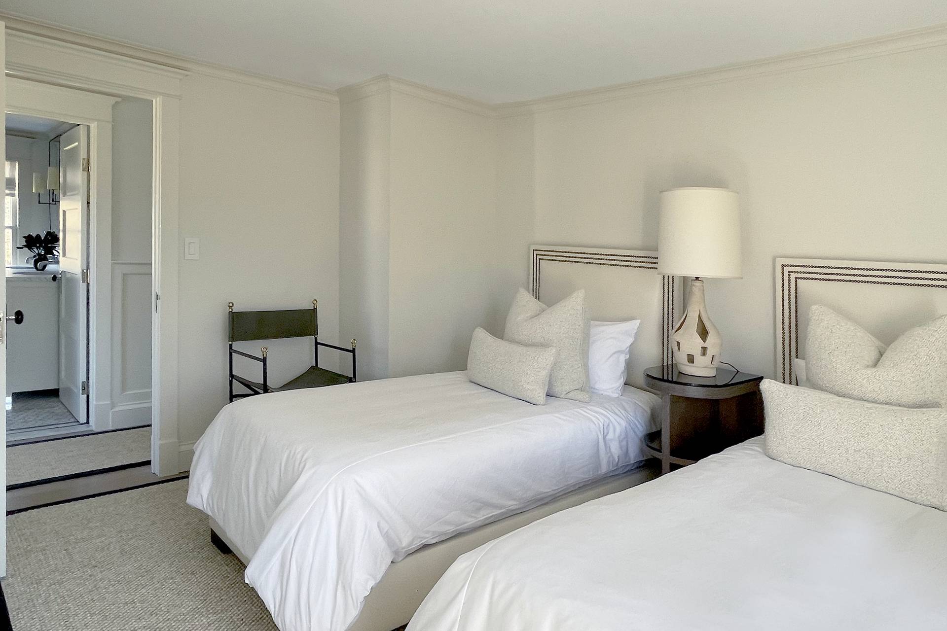 67 Norris Lane Bridgehampton, NY 11937 - Photo 23 of 32 a bedroom with a bed and a lamp