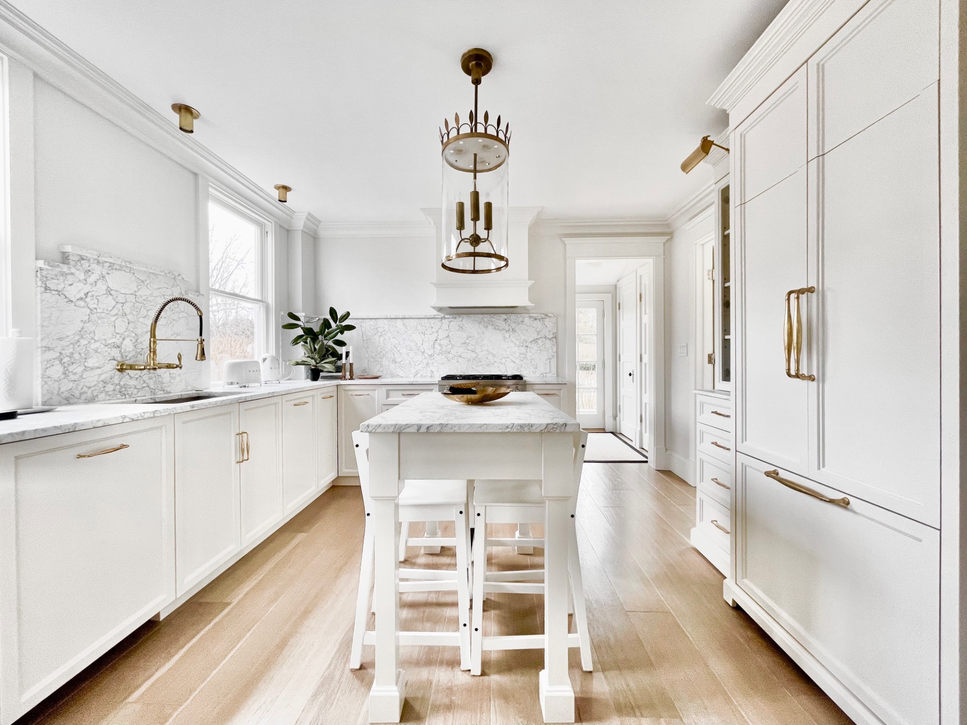 67 Norris Lane Bridgehampton, NY 11937 - Photo 10 of 32 a kitchen with a refrigerator and a sink