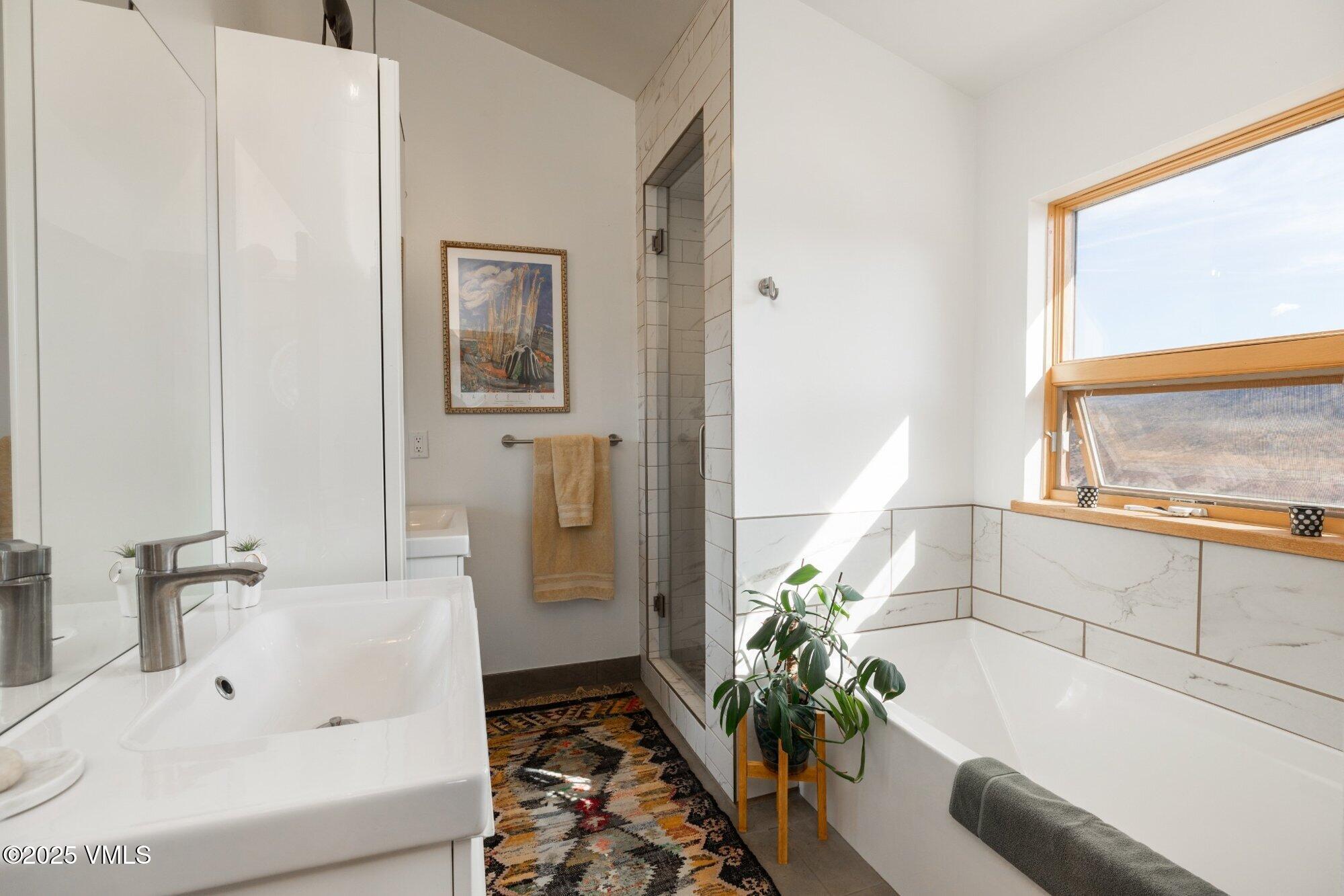 948 Wolcott Springs Road Wolcott, CO 81655 - Photo 20 of 49 a white bath tub sitting next to a white sink