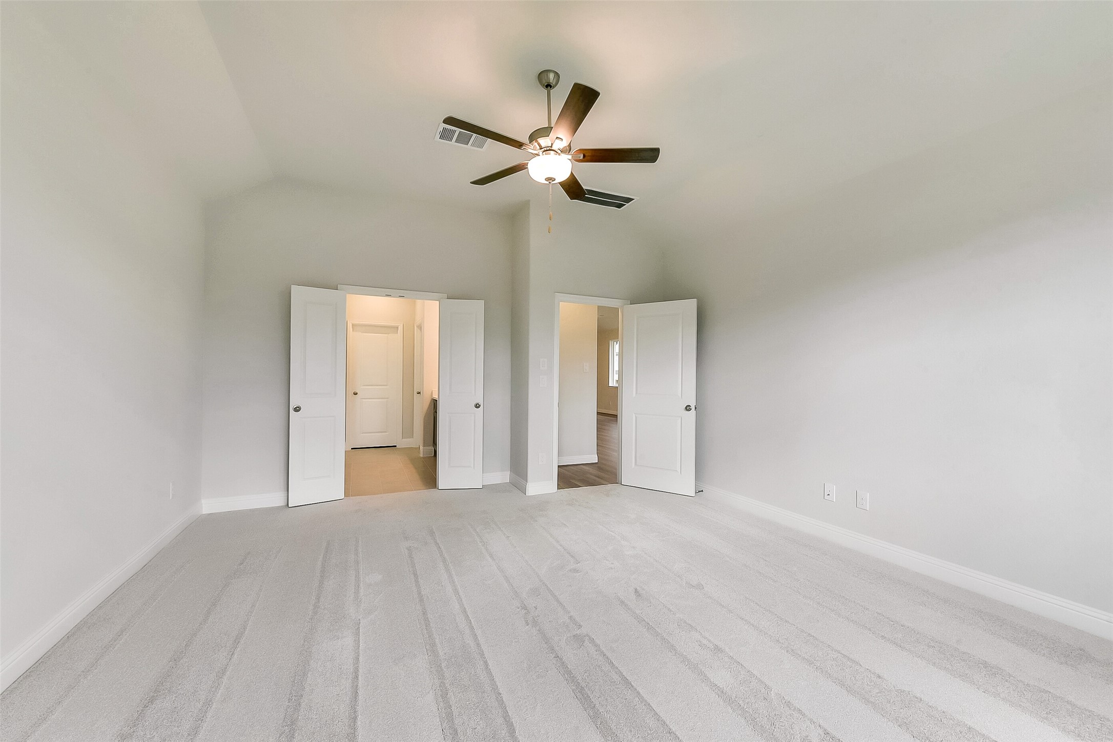 16323 Placid Stream Street Conroe, TX 77302 - Photo 18 of 36 a view of empty room with wooden floor