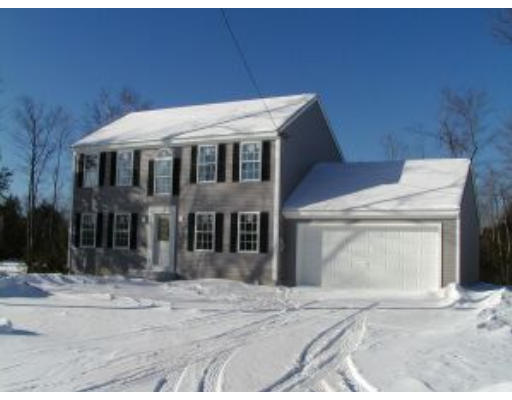 13 Taggert Circle Rindge, NH 03461 - Photo 1 of 5 a front view of a house