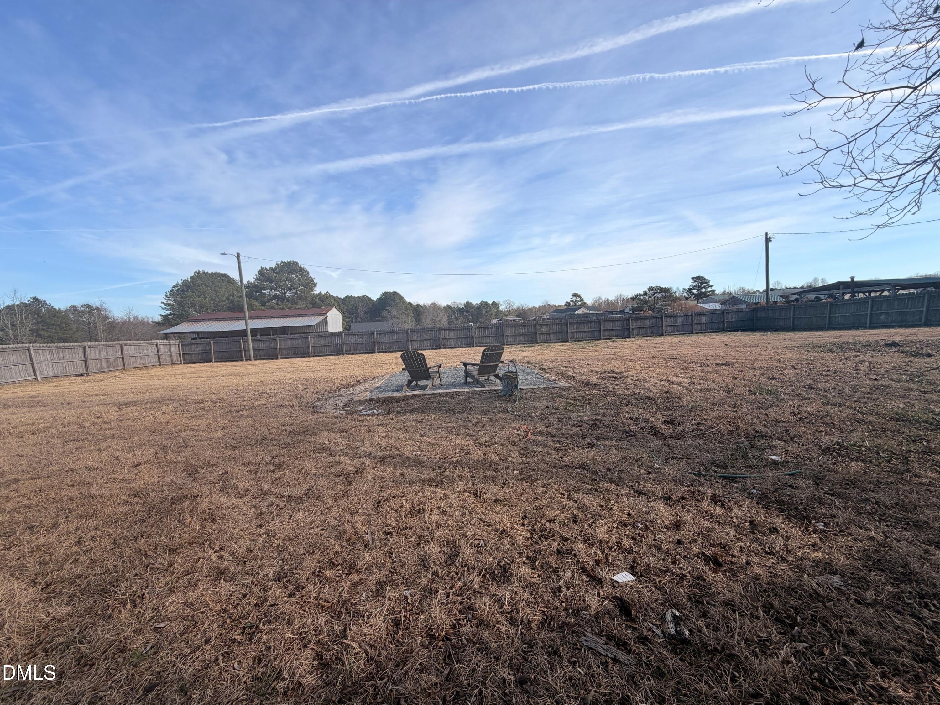 206 W Road Angier, NC 27501 - Photo 15 of 23 a view of a lake with a big yard