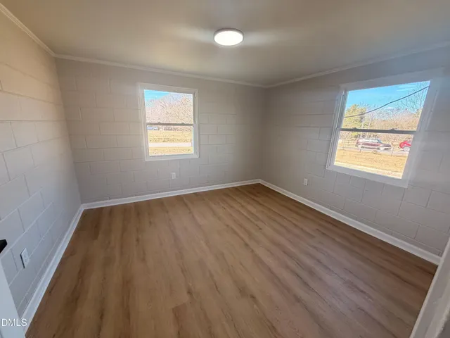 a view of an empty room and window