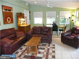 1210 Wedgewood Road Flourtown, PA 19031 - Photo 5 of 12 a living room with furniture and a window