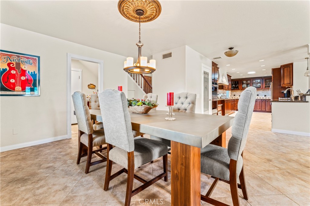 5737 Peridot Avenue Rancho Cucamonga, CA 91701 - Photo 11 of 40 a view of a dining room with furniture