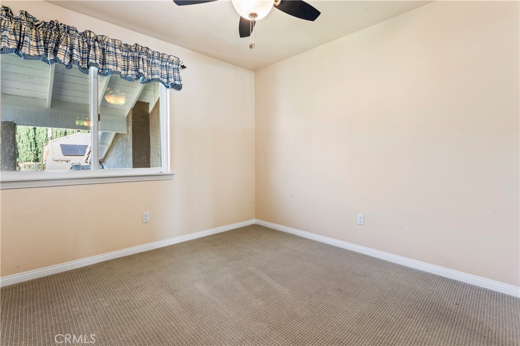 5737 Peridot Avenue Rancho Cucamonga, CA 91701 - Photo 27 of 40 an empty room with a window