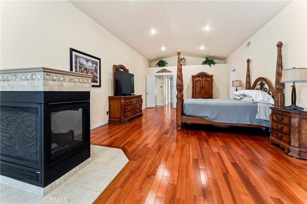 5737 Peridot Avenue Rancho Cucamonga, CA 91701 - Photo 28 of 40 a living room with furniture and a fireplace
