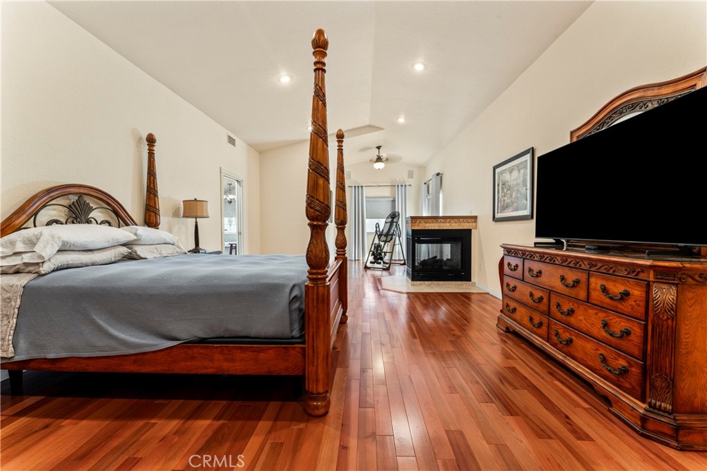 5737 Peridot Avenue Rancho Cucamonga, CA 91701 - Photo 29 of 40 a bedroom with furniture and a flat screen tv