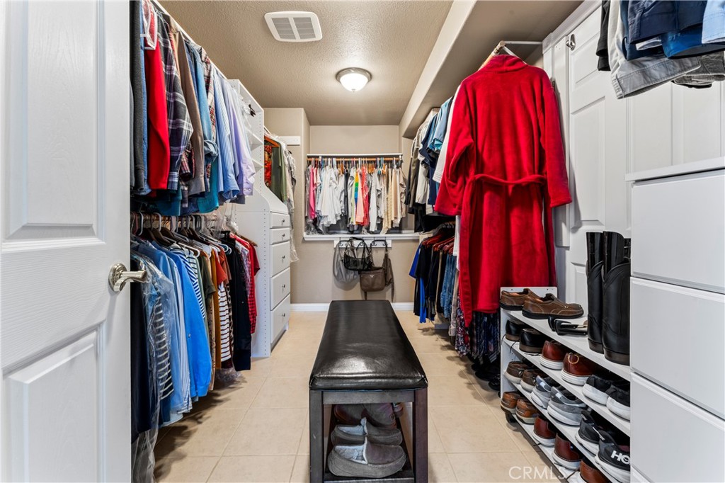 5737 Peridot Avenue Rancho Cucamonga, CA 91701 - Photo 30 of 40 a view of a walk in closet