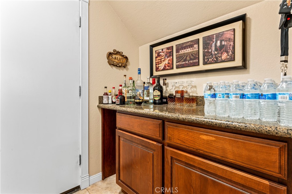 5737 Peridot Avenue Rancho Cucamonga, CA 91701 - Photo 33 of 40 a bathroom with mirror and sink