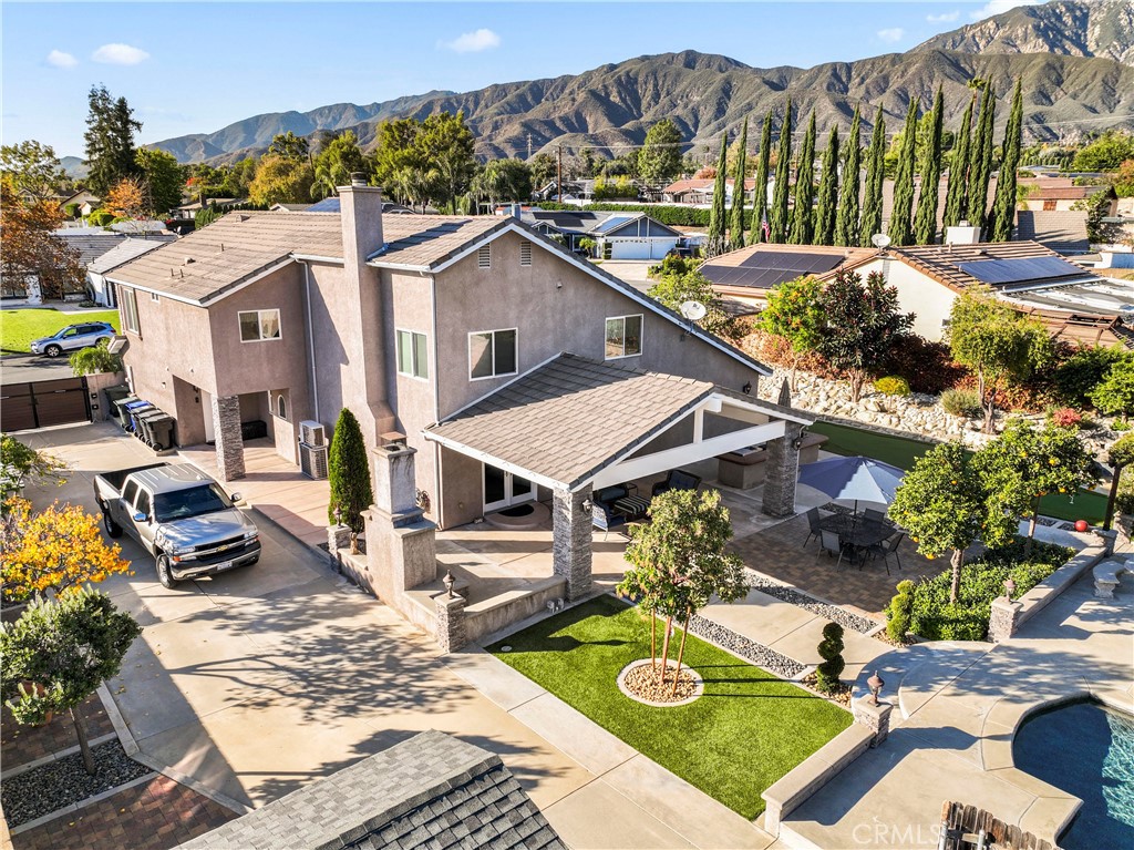 5737 Peridot Avenue Rancho Cucamonga, CA 91701 - Photo 36 of 40 a view of a patio with swimming pool