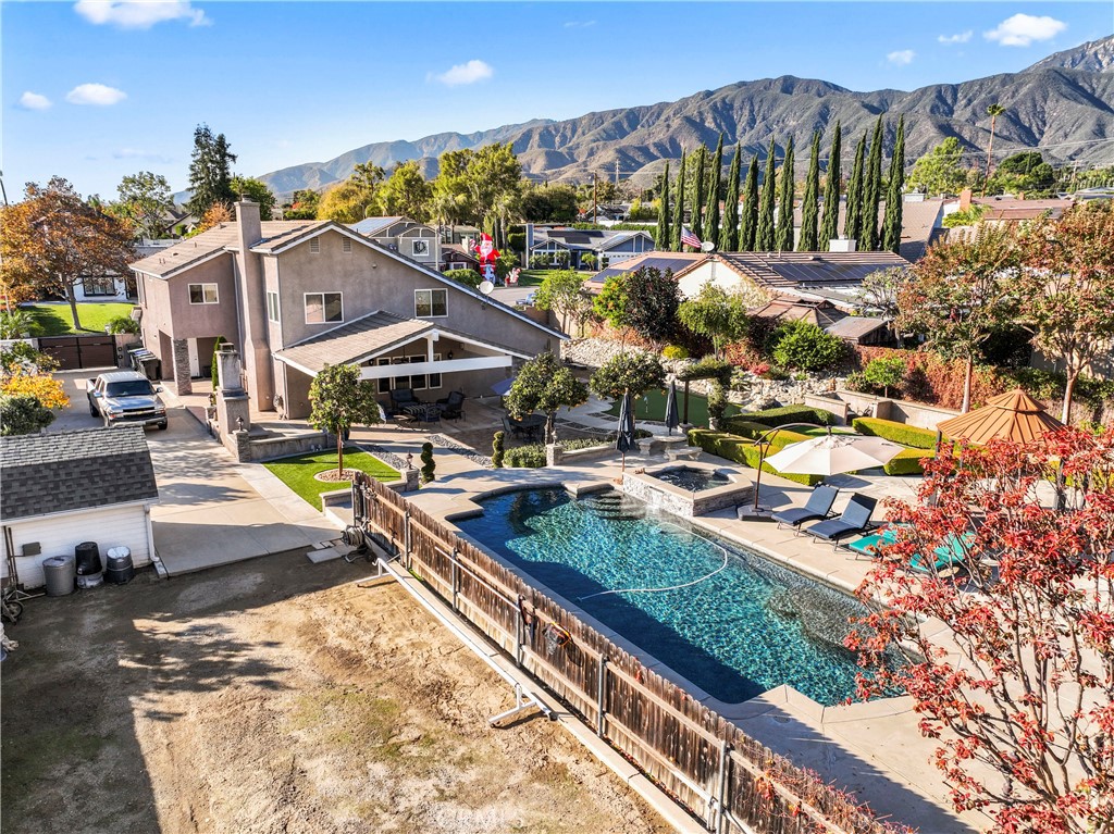 5737 Peridot Avenue Rancho Cucamonga, CA 91701 - Photo 37 of 40 a view of a swimming pool with sitting area