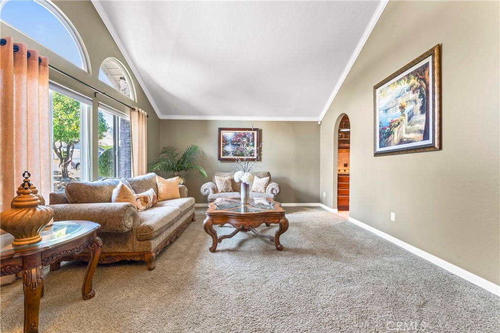 5737 Peridot Avenue Rancho Cucamonga, CA 91701 - Photo 8 of 40 a living room with furniture and a large window