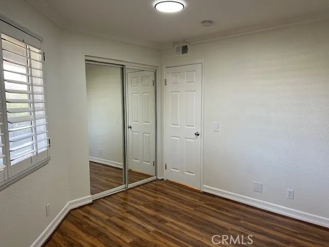 a view of parking garage with cars