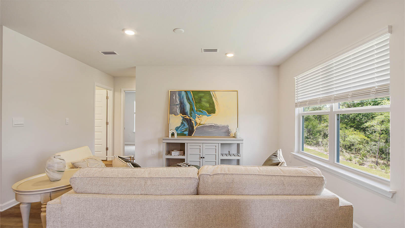 127 Dockside Road Freeport, FL 32439 - Photo 11 of 28 a living room with furniture and a large window