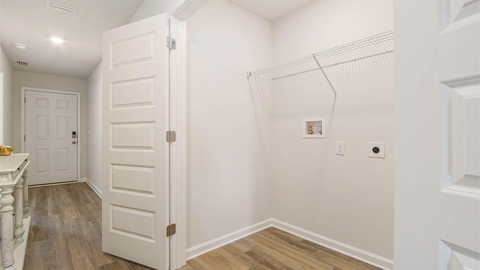 127 Dockside Road Freeport, FL 32439 - Photo 25 of 28 a view of walk in closet with wooden floor