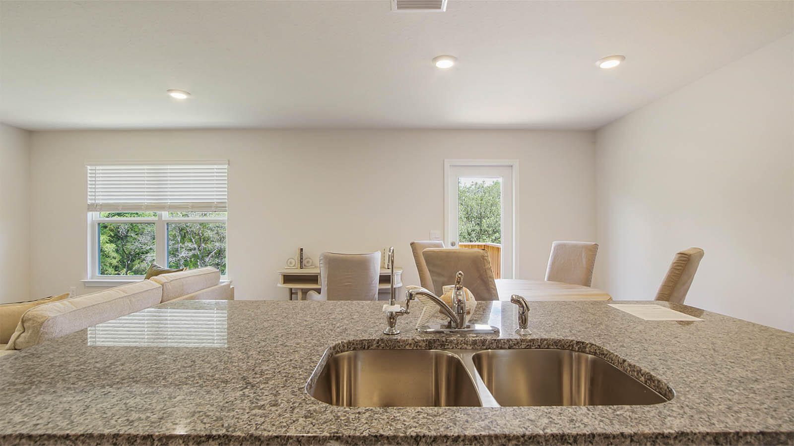 127 Dockside Road Freeport, FL 32439 - Photo 8 of 28 a kitchen with a sink a counter space and a window