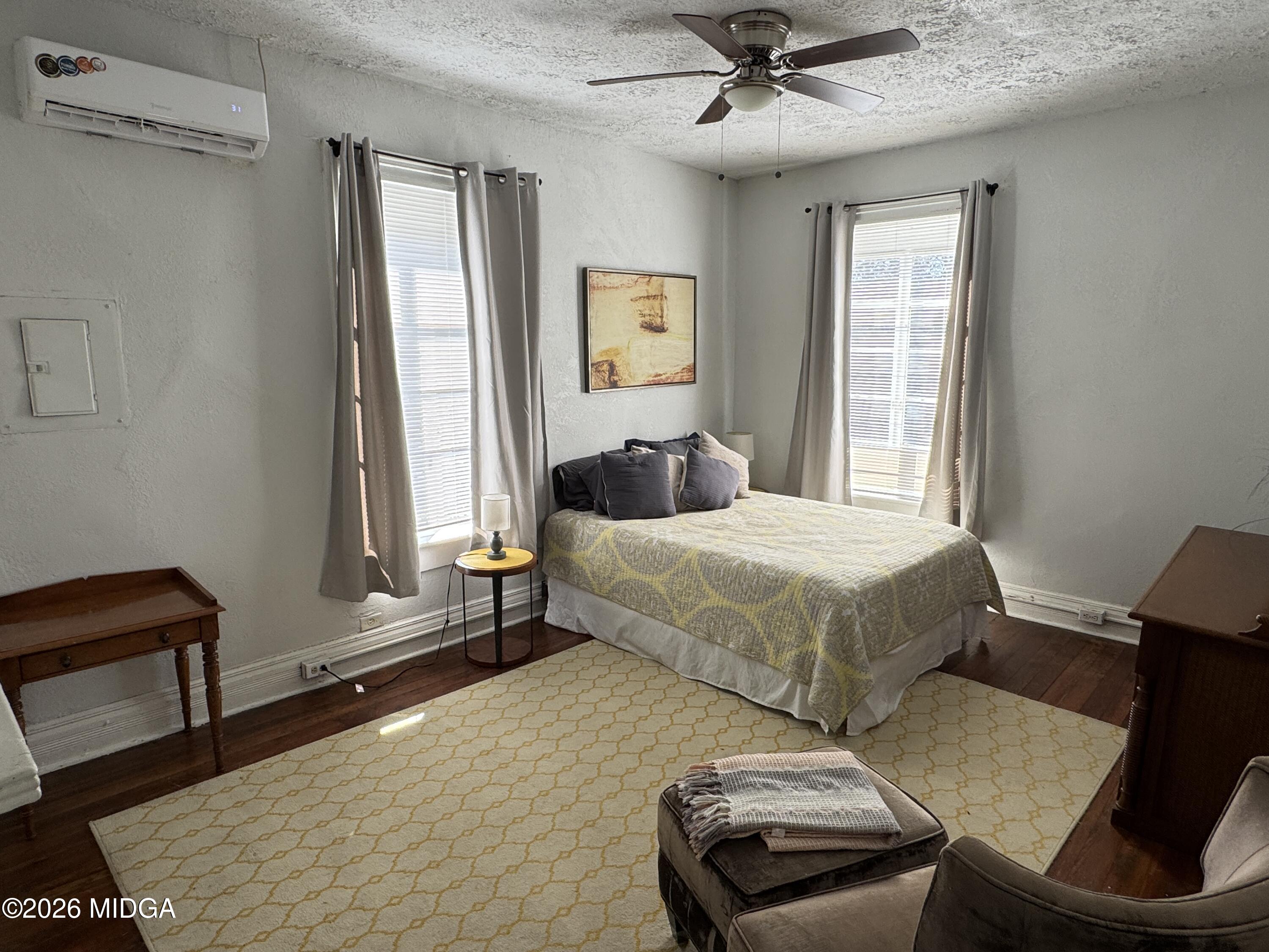 1687 Lawton Avenue Macon, GA 31201 - Photo 15 of 22 a bedroom with a bed and a window