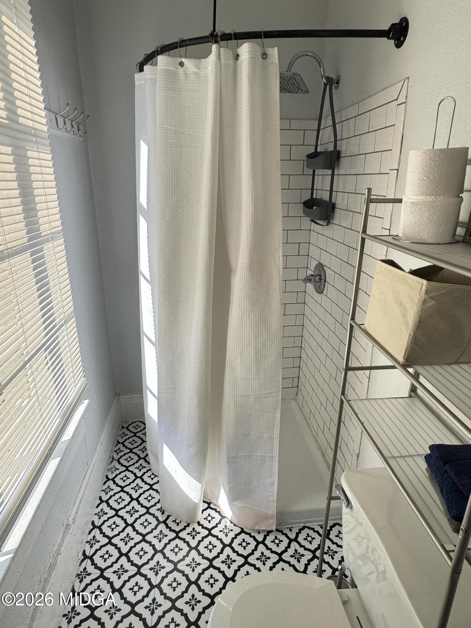 1687 Lawton Avenue Macon, GA 31201 - Photo 19 of 22 a bathroom with a shower