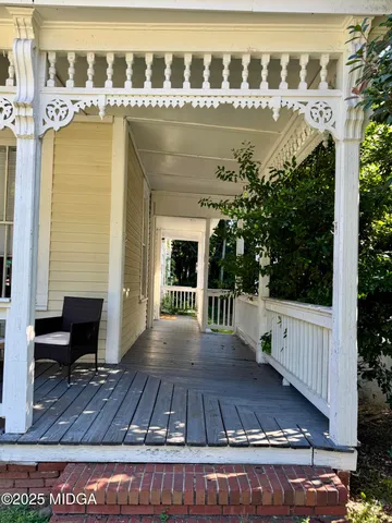 a view of swimming pool with seating space