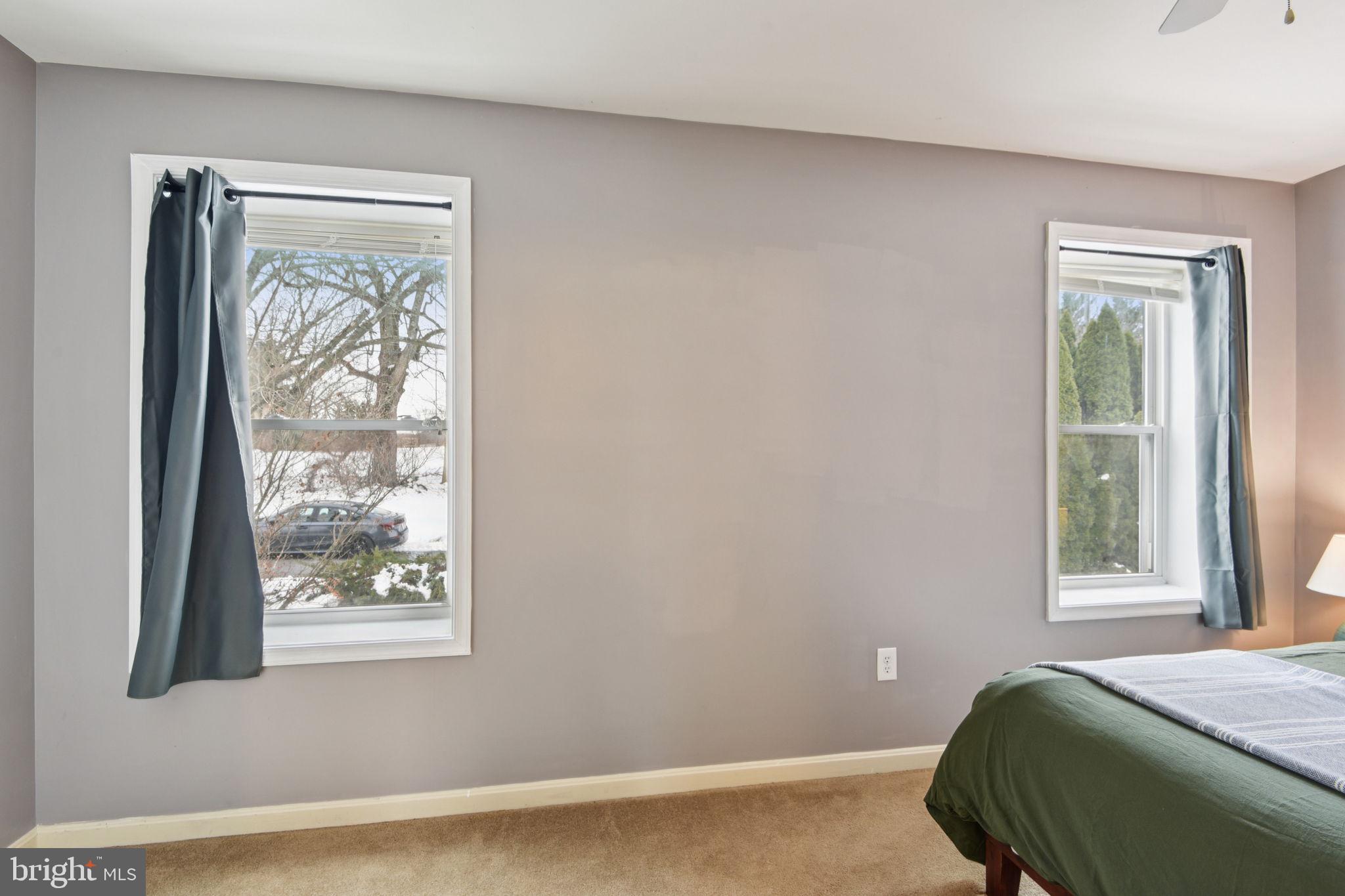 14844 Toll Road New Windsor, MD 21776 - Photo 17 of 30 a living room with a bed and a window