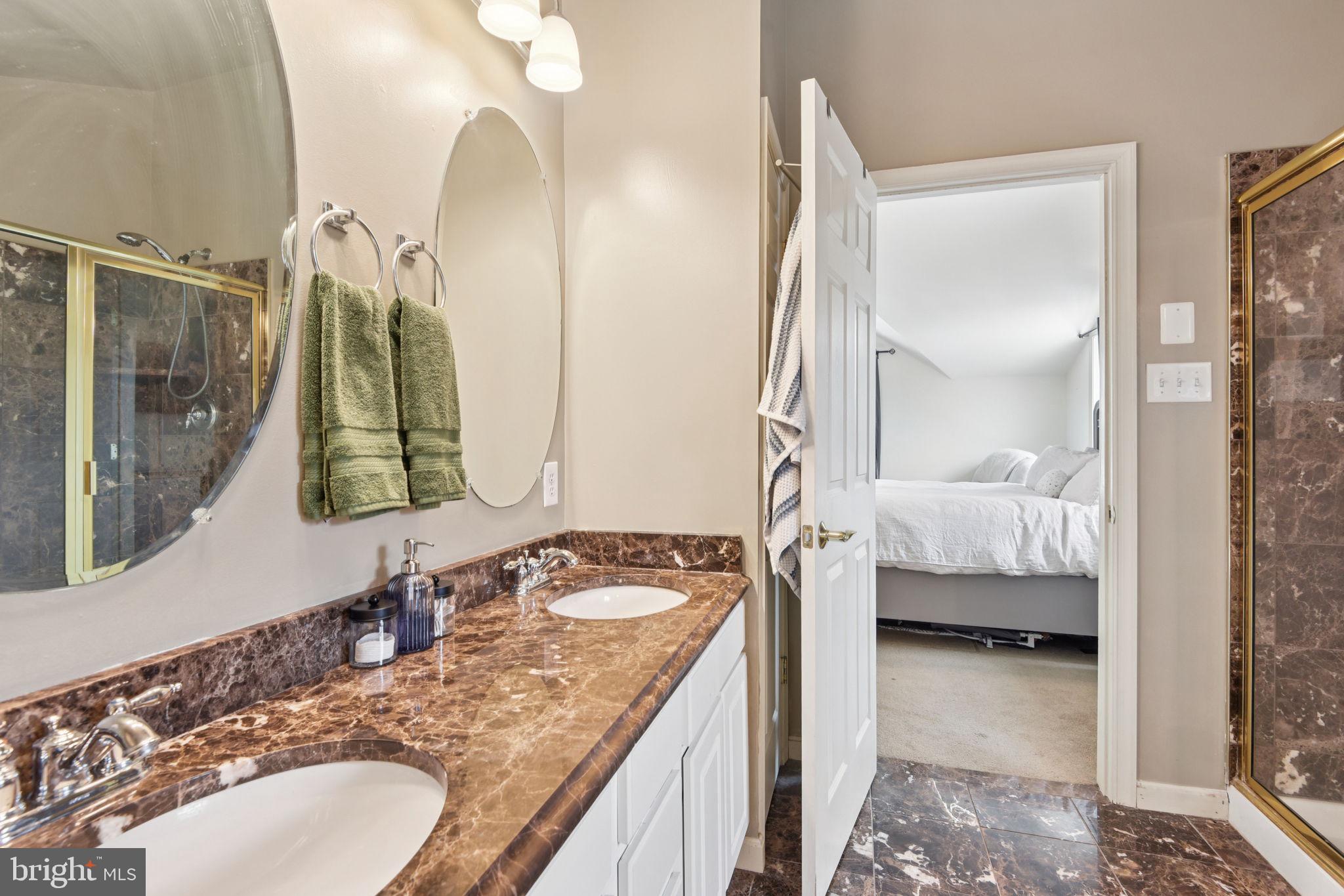 14844 Toll Road New Windsor, MD 21776 - Photo 29 of 30 a en suite bathroom with a granite countertop sink and a mirror