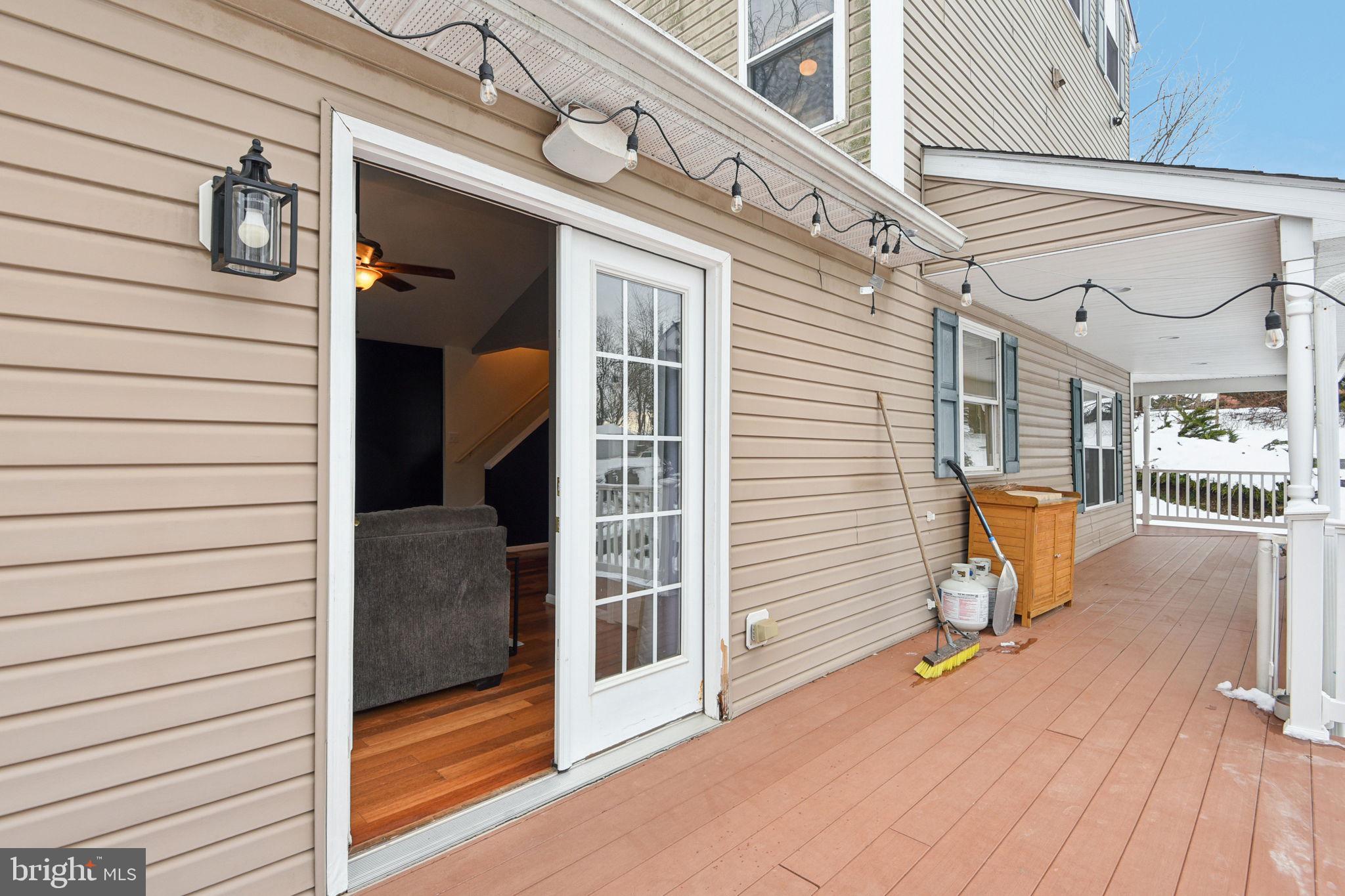 14844 Toll Road New Windsor, MD 21776 - Photo 30 of 30 a view of a porch with a door and a porch
