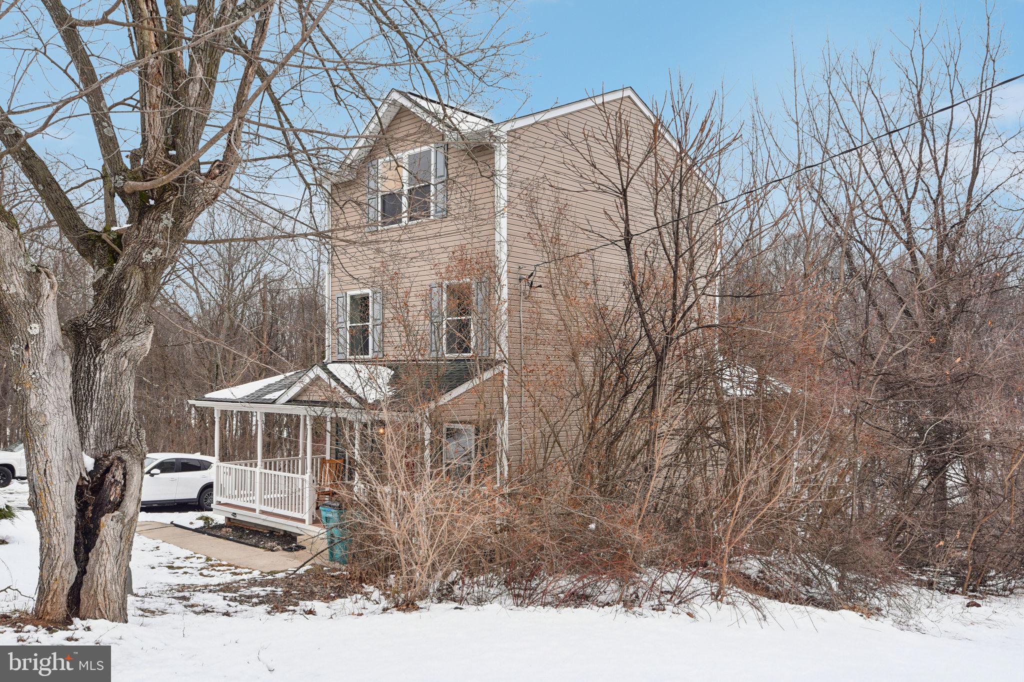 14844 Toll Road New Windsor, MD 21776 - Photo 3 of 30 a view of a house with a yard