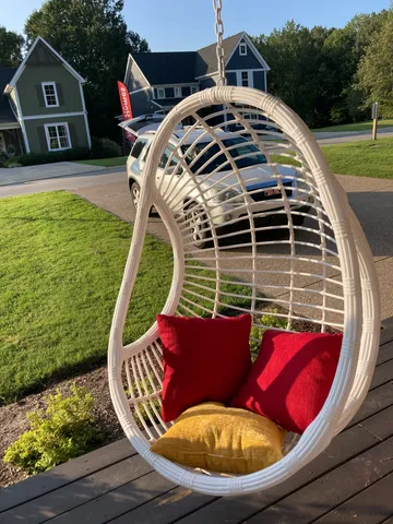 a view of roof deck with chairs