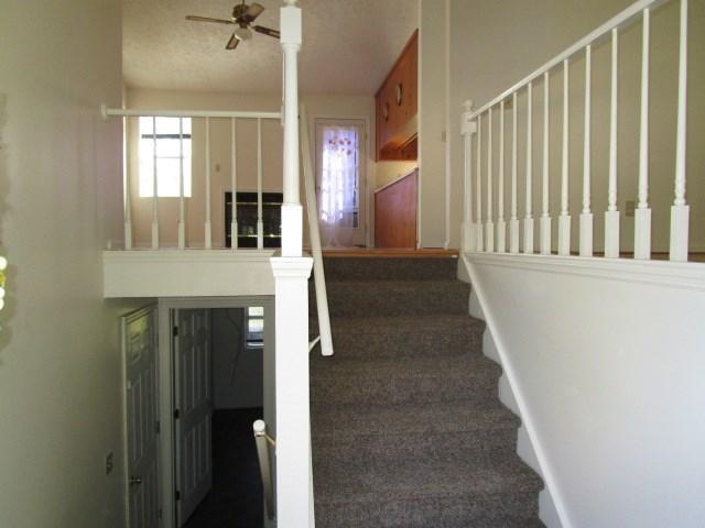 2704 The Great Road Fieldale, VA 24089 - Photo 2 of 14 a view of a hallway with wooden floor and staircase