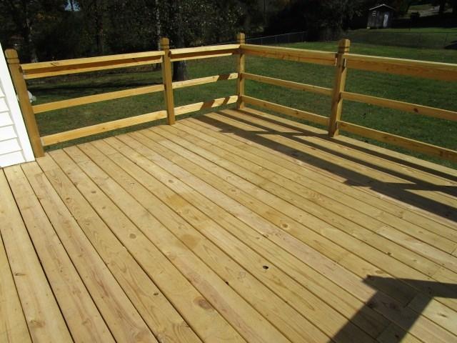 2704 The Great Road Fieldale, VA 24089 - Photo 13 of 14 a view of outdoor space and deck in the backyard