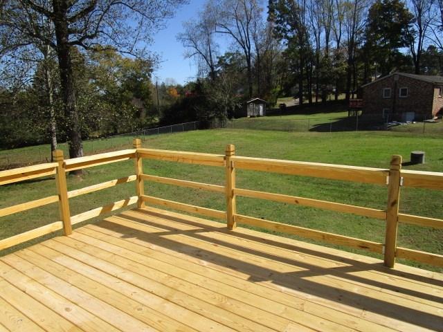 2704 The Great Road Fieldale, VA 24089 - Photo 14 of 14 a view of outdoor space with deck and yard