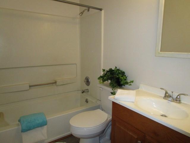 2704 The Great Road Fieldale, VA 24089 - Photo 8 of 14 a bathroom with a sink toilet and shower