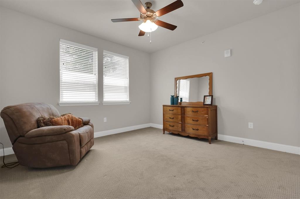 651 Watters Road, Unit 2105 Allen, TX 75013 - Photo 14 of 32 a room with furniture and windows