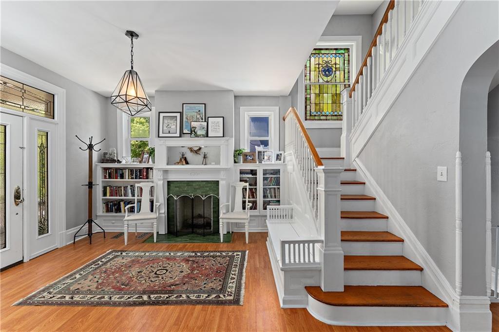 709 Maple Lane Sewickley, PA 15143 - Photo 6 of 31 Stained glass, built ins, fireplace. Could you ask for a better entrance?