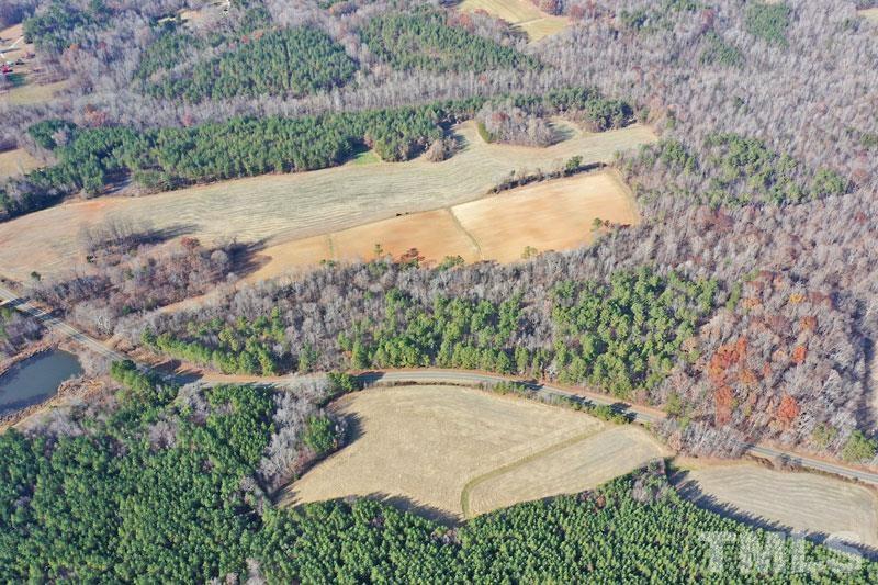 3747 Old Allensville Road Roxboro, NC 27574 - Photo 16 of 45 a view of a yard with mountain