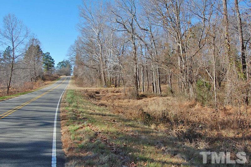 3747 Old Allensville Road Roxboro, NC 27574 - Photo 20 of 45 a view of a yard with trees