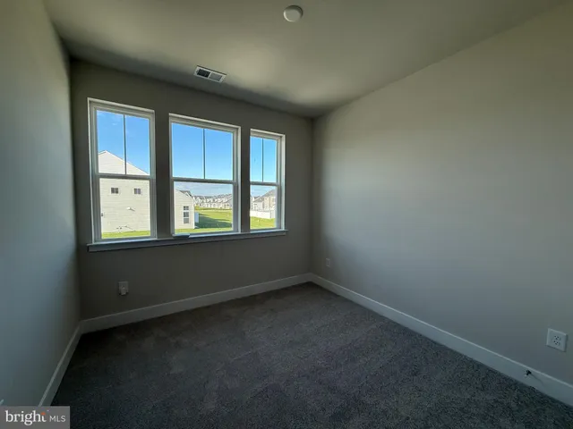 a view of a lake with a city