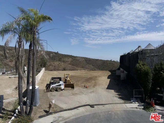 a view of a car parked on the side of the road