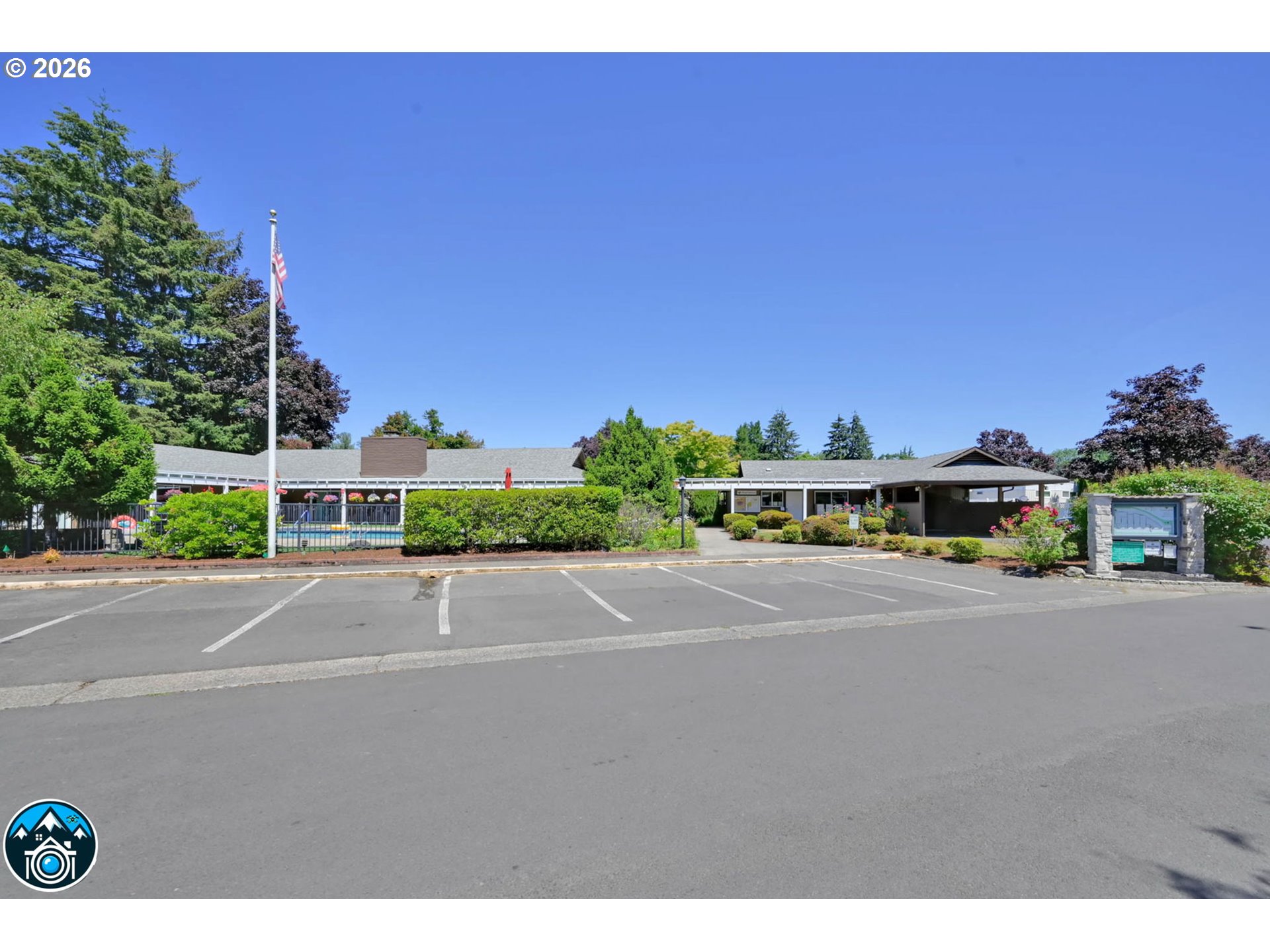1475 Green Acres Road, Unit 150 Eugene, OR 97408 - Photo 32 of 34 a view of a city street with a building