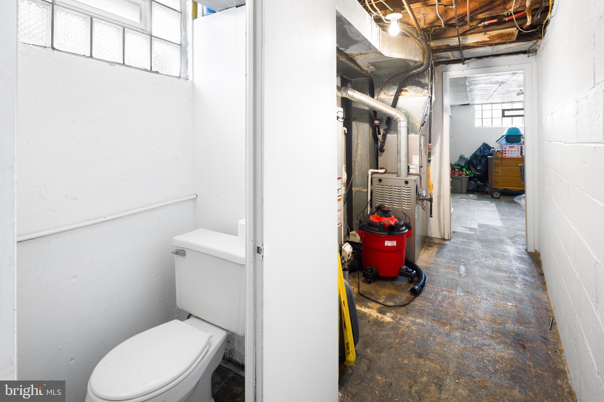 7851 Horrocks Street Philadelphia, PA 19152 - Photo 11 of 15 a bathroom with a toilet and a shower